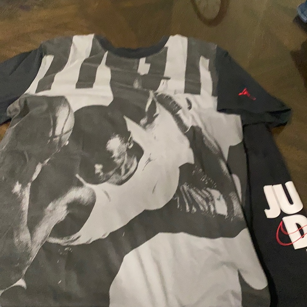 Air Jordan t-shirt and Nike sweat-shorts.